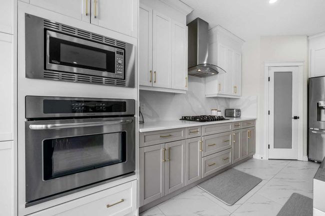 316 Kinniburgh Link, House other with 5 bedrooms, 4 bathrooms and 6 parking in Chestermere AB | Image 17