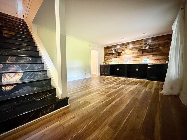 Living room with new flooring installed | Image 5