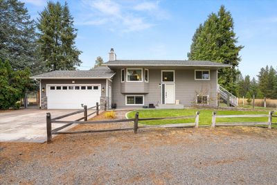 1102 W North Dragoon Dr, Home with 4 bedrooms, 3 bathrooms and null parking in Colbert WA | Image 1