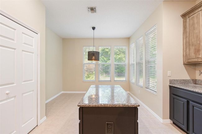11933 Pasco Trails Blvd, House other with 4 bedrooms, 3 bathrooms and null parking in SPRING HILL FL | Image 14