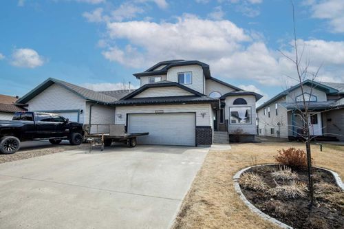 10741 72 Avenue, Home with 4 bedrooms, 2 bathrooms and 4 parking in Grande Prairie AB | Card Image