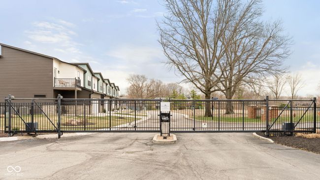 Gated entry to the condo building gives security | Image 32