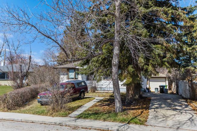 7 Tamarac Crescent, Home with 3 bedrooms, 1 bathrooms and 1 parking in Calgary AB | Image 5