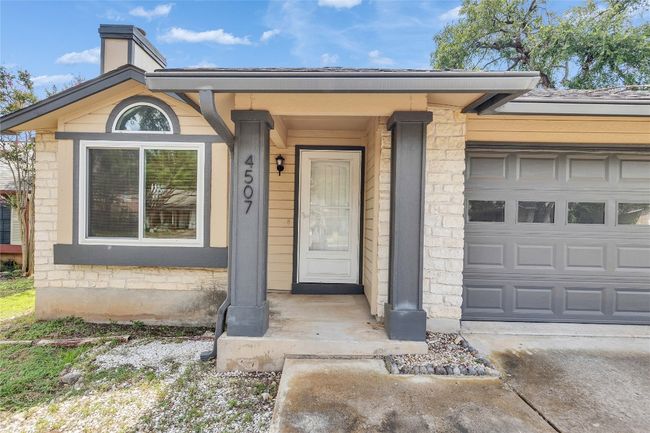 Entrance to property with stone siding | Image 21