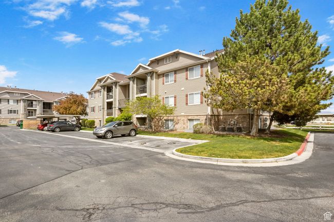 View of property featuring uncovered parking and a residential view | Image 25