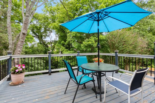 Deck off of main living den. Full deck repair & paint job almost complete! | Image 33
