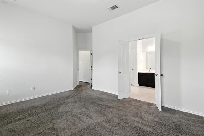 Unfurnished bedroom featuring carpet flooring and baseboards | Image 28