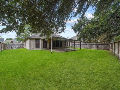 THE PERFECT SIZE BACK YARD!! NOT TOO BIG AND NOT TOO SMALL! YOU WILL LOVE THE COVERED BACK PORCH! | Image 2