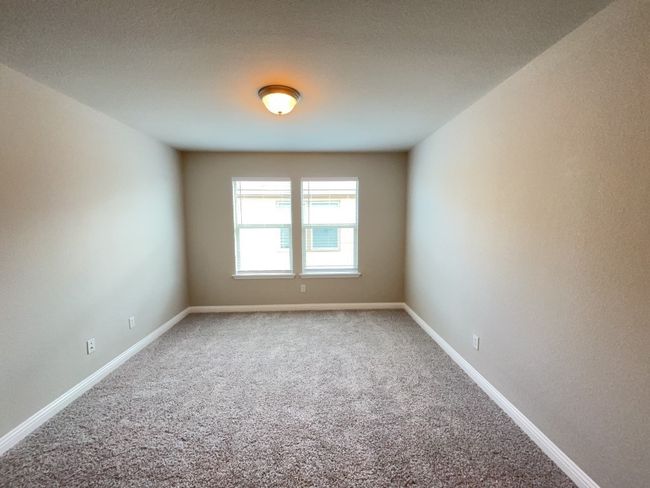 Bed room featuring carpet flooring and baseboards | Image 16