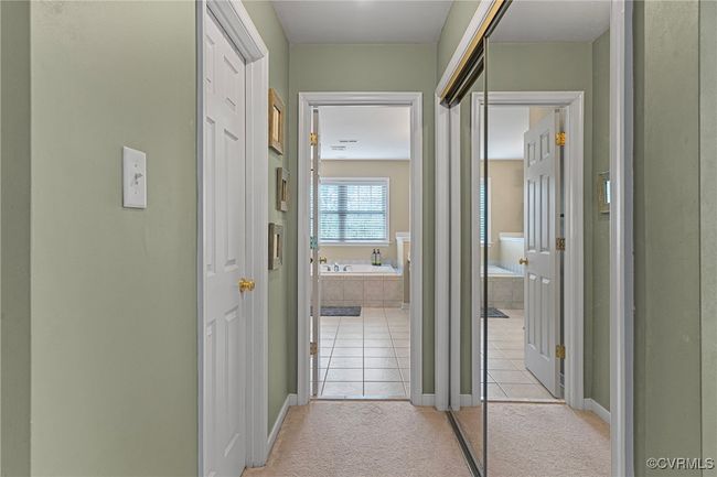 Corridor with baseboards and light tile patterned flooring | Image 40