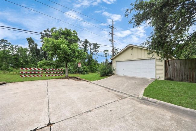 Side view of detached garage. | Image 4