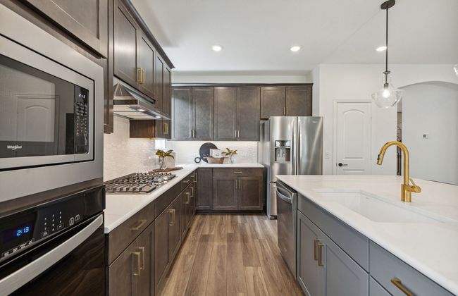 Gourmet kitchen designed for culinary excellence and entertaining *Model representation | Image 6