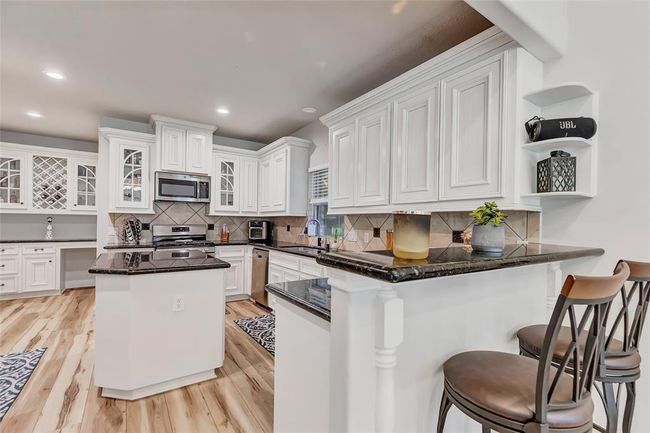 Oversized kitchen with tons of cabinets and storage | Image 18