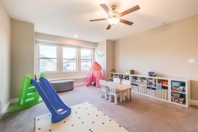 The spacious gameroom is a blank canvas for your imagination! | Image 25