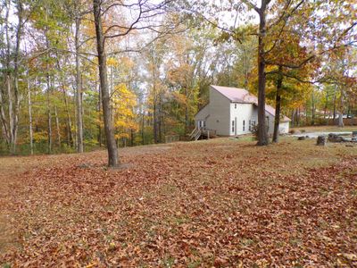 Wide lot, plenty of room on either side of the house for a garage or fenced yard. | Image 2