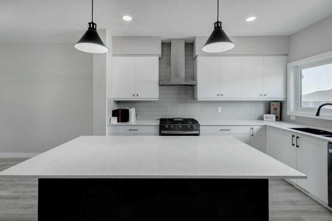 82 Edith Green Nw, Home with 4 bedrooms, 3 bathrooms and 2 parking in Calgary AB | Image 9