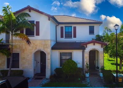 10587 - 10587 W 33rd Ct, Home with 3 bedrooms, 3 bathrooms and null parking in Hialeah FL | Image 1