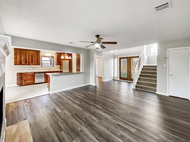 Open floor plan with a living and kitchen combo. | Image 7
