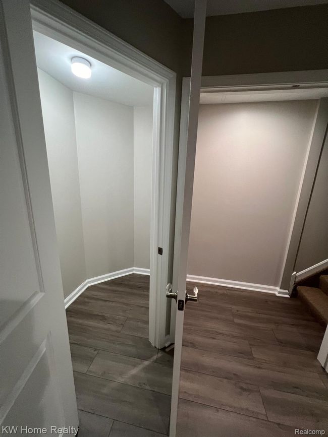 Basement landing w/large closet. Storage thru-out. | Image 22