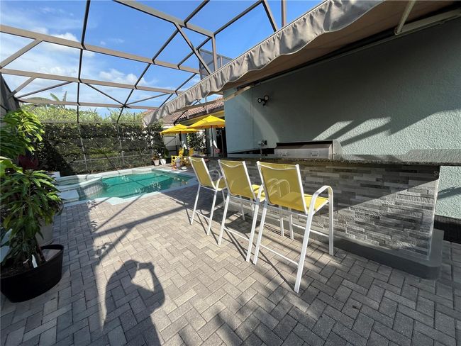 2540 Swoop Cir, House other with 5 bedrooms, 3 bathrooms and null parking in KISSIMMEE FL | Image 35