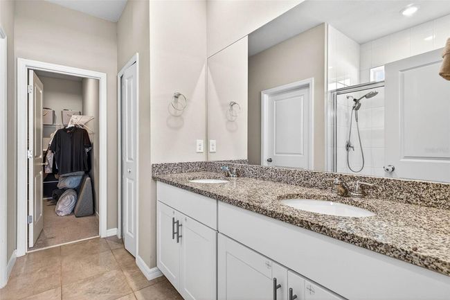 Dual sinks in the primary ensuite bath. | Image 19