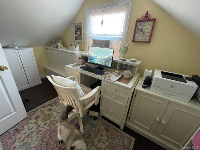 Home office with vaulted ceiling and dark wood finished floors | Image 15