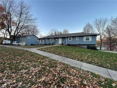 Ranch-style house with a front lawn | Image 2