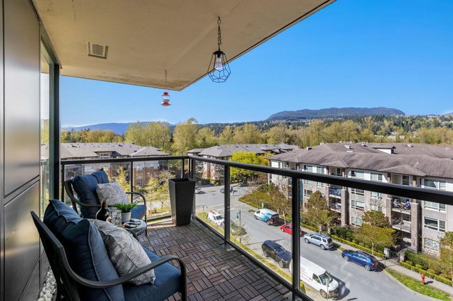 Balcony with visible vents and a mountain view | Image 22