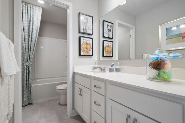 Upper level bath with dual-sinks (not shown). Model photo. Options and colors will vary. | Image 27