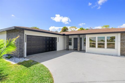 18 Oakland Hills Pl, Rotonda West, FL, 33947-2233 | Card Image
