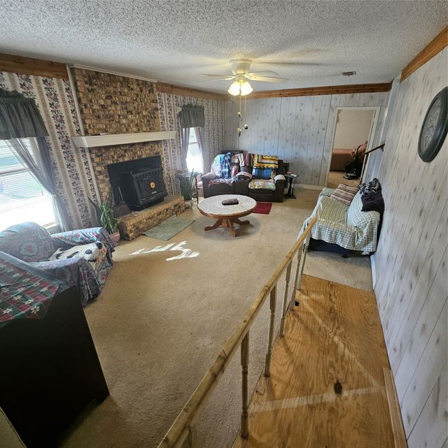 Living room with fireplace | Image 21