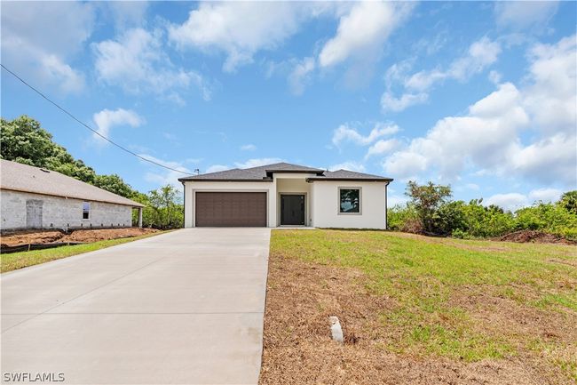 View of front of property with a garage and a front yard | Image 11