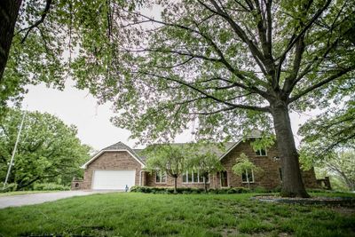 View of front facade featuring a garage and a front lawn | Image 3