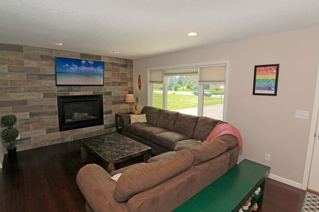 Living room with gas fireplace. | Image 11