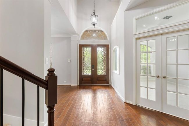 Double doors on right into the flex room with picture window at entry. This would be a a great 2nd office, music, excercise, or hobby room. | Image 9