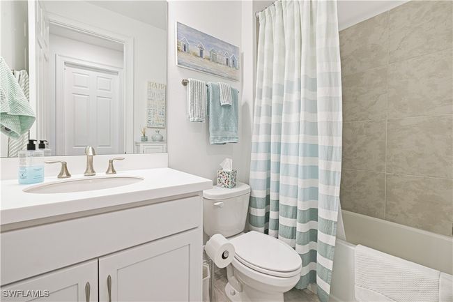 Full bathroom with vanity and shower / tub combo | Image 21