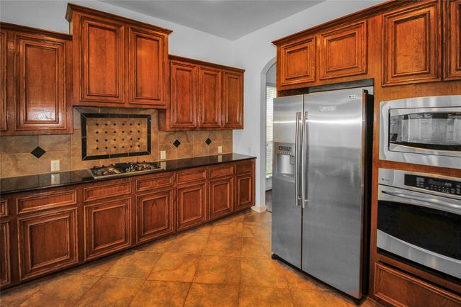 13204 Quiet Lake Ln, House other with 5 bedrooms, 4 bathrooms and 2 parking in Pearland TX | Image 8