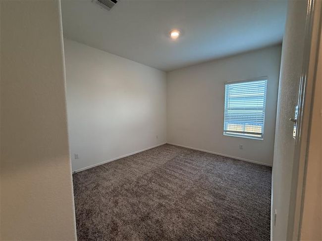 Empty room with carpet and baseboards | Image 10
