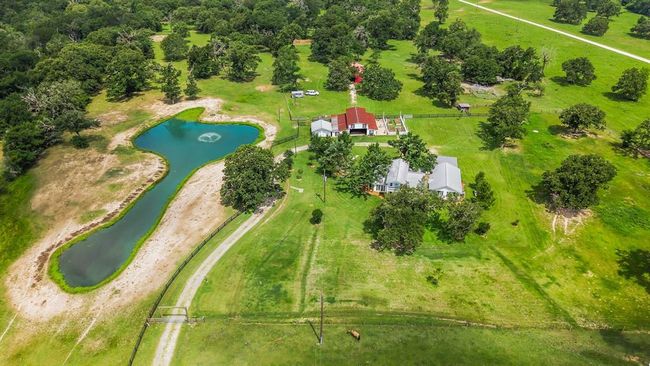 Your horses in the barn, your cattle roaming free, a fishing line in the pond and a big buck walking into the clearing...this lifestyle could be yours! | Image 49