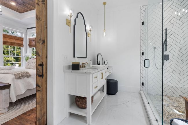 Master Bath has vanities on each side of the doorway | Image 80