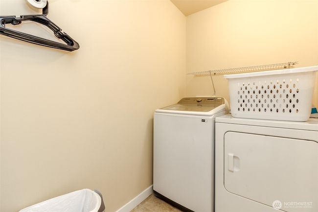 Convenient upstairs laundry. | Image 15