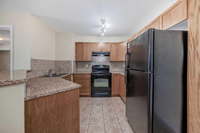 340 - 428 Chaparral Ravine View Se, Home with 2 bedrooms, 2 bathrooms and 1 parking in Calgary AB | Image 4