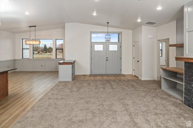 Entryway featuring light hardwood / wood-style floors and vaulted ceiling | Image 4
