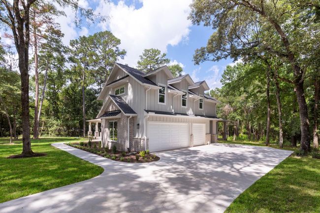 Absolutely beautiful over the top custom farmhouse style home in Magnolia on 1.7 acres! | Image 40