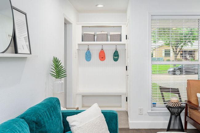 Hall tree at the entry is ideal for guest to hang their coats, backpacks & shoe storage. | Image 10