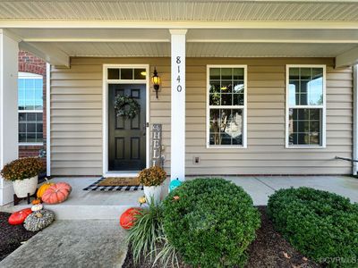 Entrance to property featuring a covered porch | Image 3