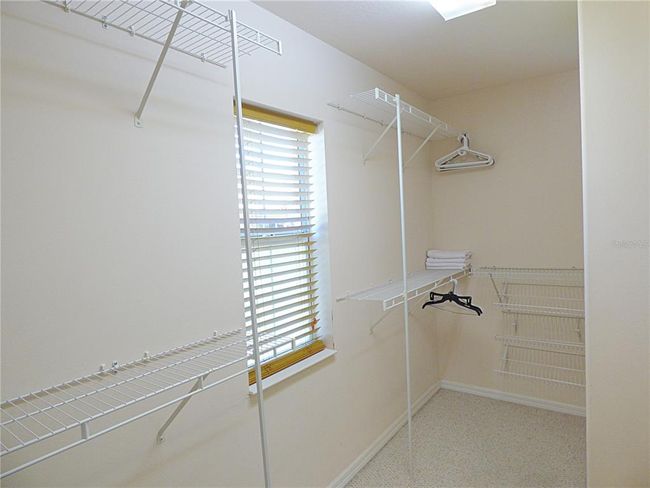 dressing room with railing and window | Image 44