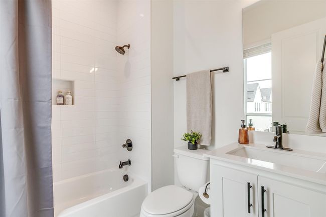 Full bathroom featuring vanity, toilet, and shower / bath combo | Image 26