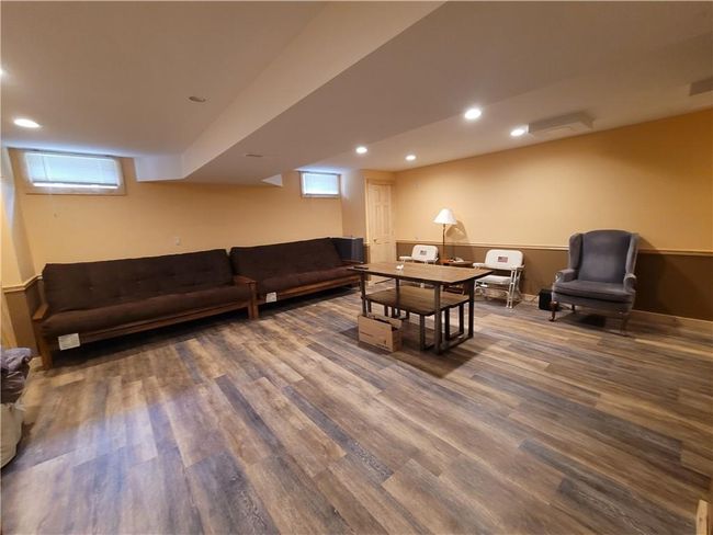 Living room with hardwood / wood-style flooring | Image 17