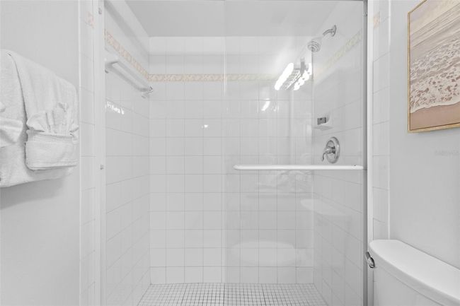 guest bathroom has shower | Image 22